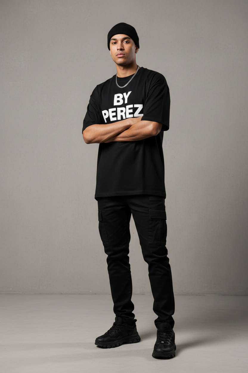 Man wearing BY PEREZ black bold logo t-shirt