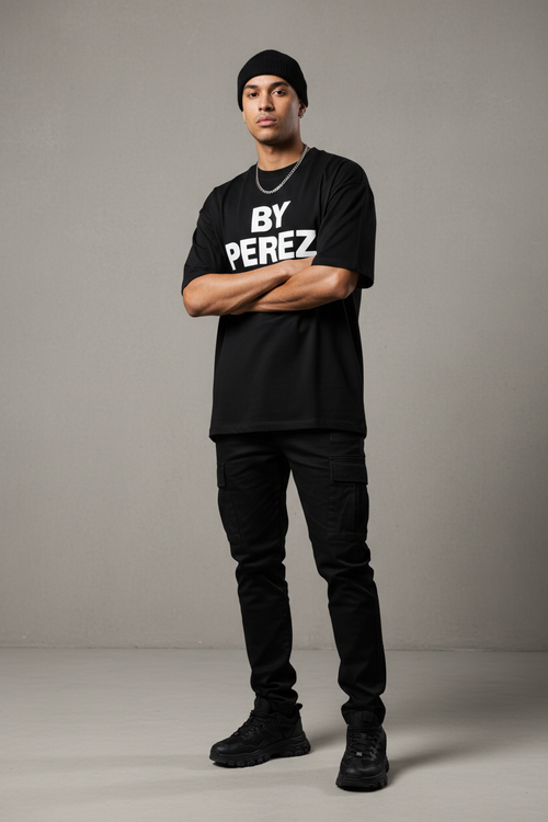 Man wearing BY PEREZ black bold logo t-shirt